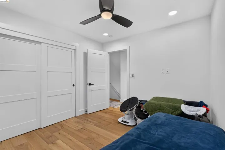 Hardwood-finish flooring complementing white walls