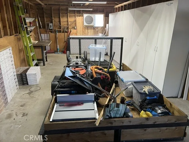PLENTIFUL STORAGE IN GARAGE.