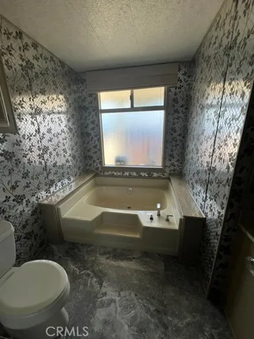 SEPARATE TUB IN MASTER BATHROOM