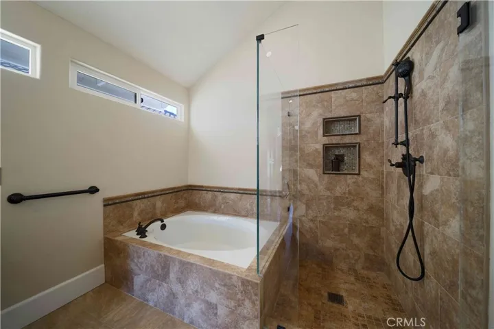 Soaking Tub and Shower in Primary Bathroom