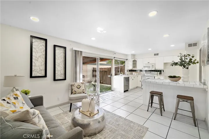Family Room and Kitchen with Slider to Backyard Patio