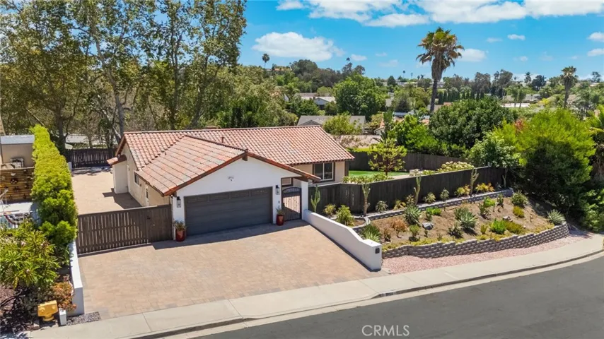 Very private, recently remodeled SINGLE STORY home with open floor plan and room for RV & Boat! It has it ALL!