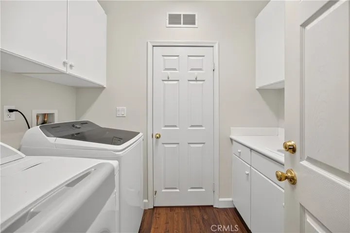Laundry Room with Storage and Utility Sink