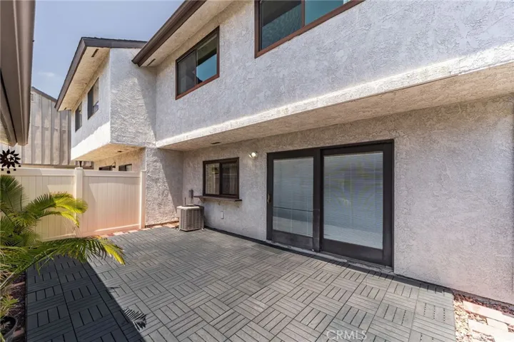 Patio and sliding glass door enterance to home.