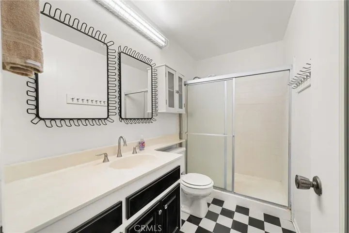 Primary bathroom with step-in shower.