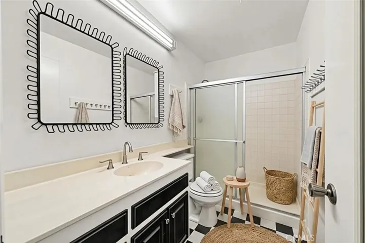 Primary bathroom,  virtually staged and photo enhanced.