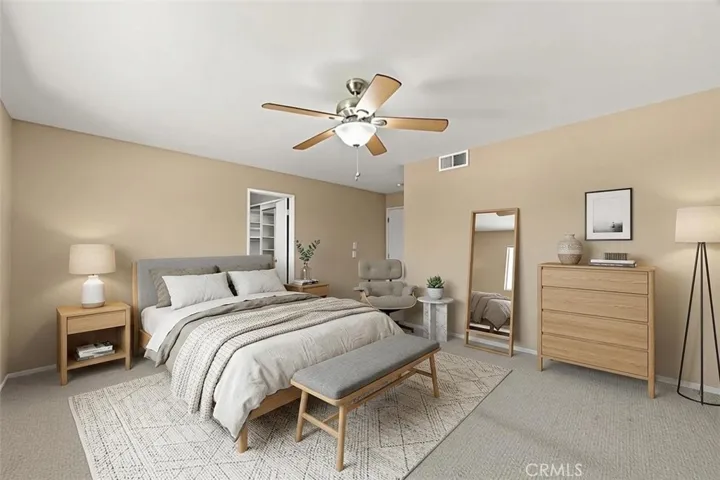 Primary bedroom,  virtually staged and photo enhanced.