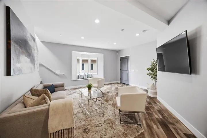 Finished lower level: Family Room, Private Bedroom, Full Bath, Office, and Wine Cellar.