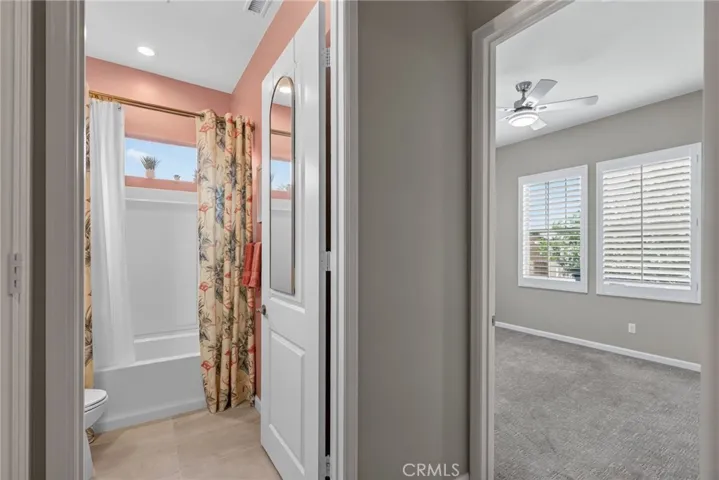 view into guest room and guest bathroom