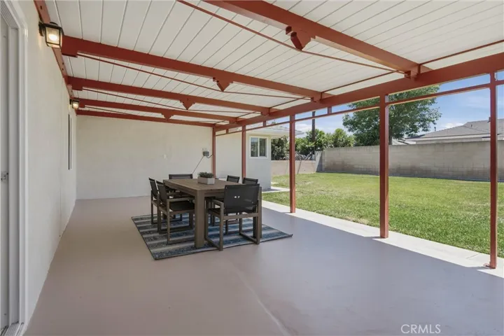 Imagine entertaining, dining or just relaxing under this massive covered patio.