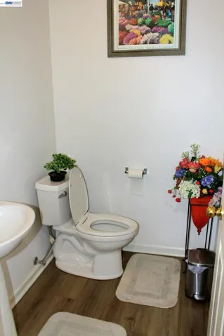 Main-level half bath adds everyday convenience.