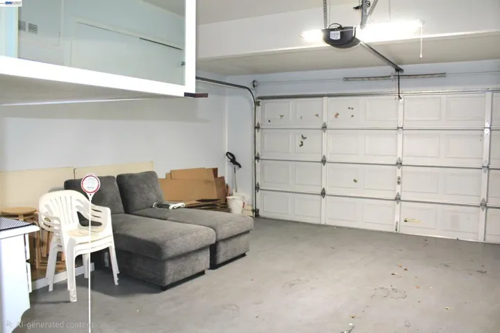 Attached two-car garage offers ample parking, overhead storage, and plenty of space for organization, hobbies, or a workshop while keeping everything neatly tucked away