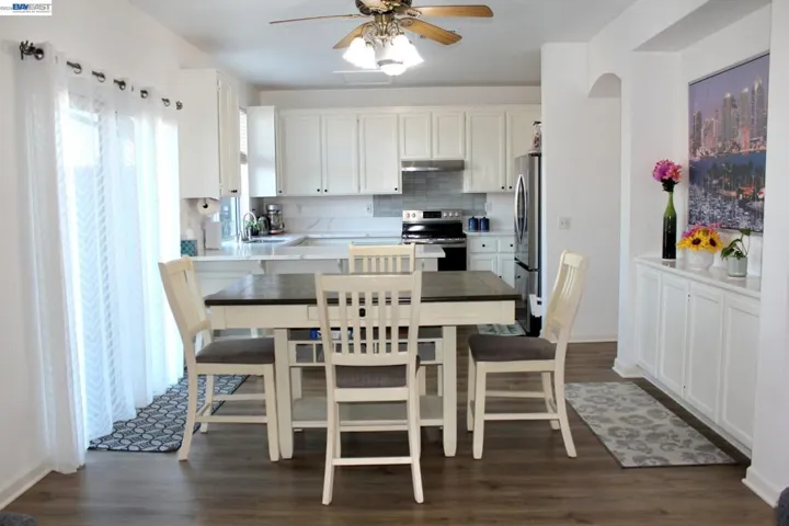 Spacious dining area with beautiful natural light, an open floor plan, and direct access to the kitchen. Designed for comfortable family meals and effortless entertaining.