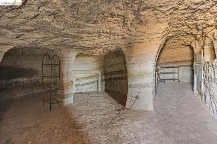 Cave featuring natural rock walls and ceilings