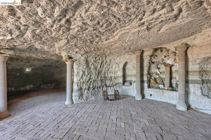 Cave featuring natural rock walls and ceiling