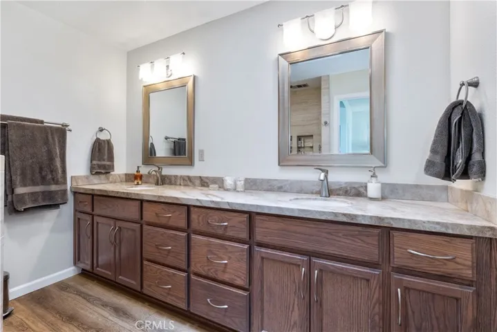 Primary bathroom with quartz counter tops and double sinks