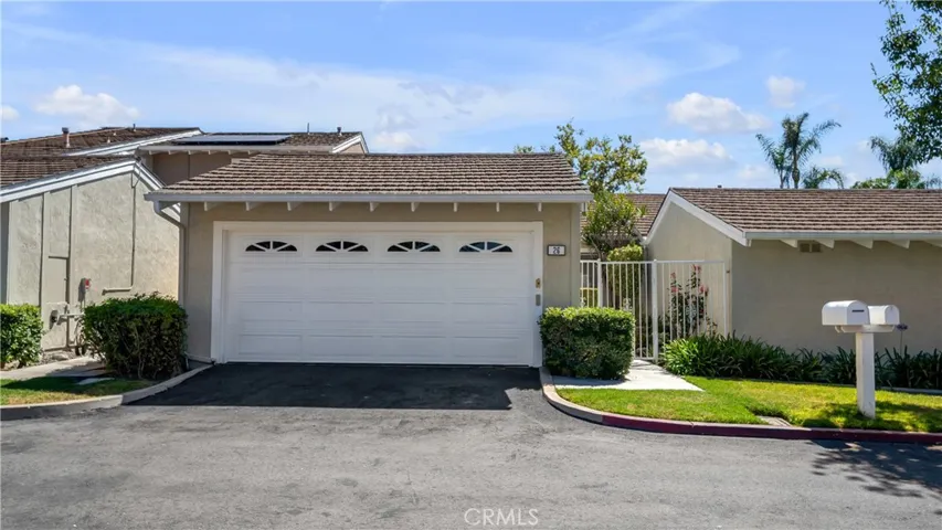 A large 2 car garage and directly across is guest parking.