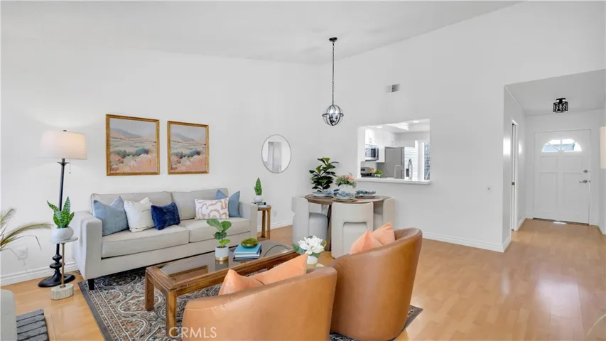 Enjoy a spacious living room. The two story ceilings create an open, airy atmosphere.