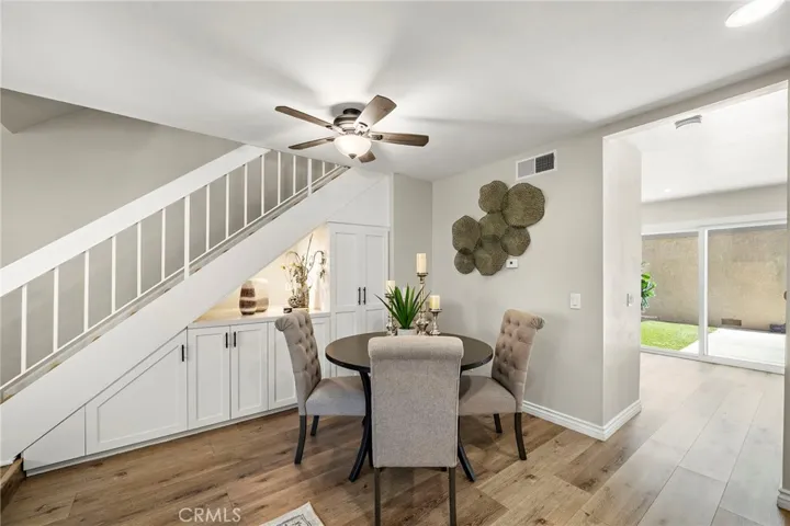 thoughtfully designed Custom built-in charging station with cabinetry recently added to the spacious living room
