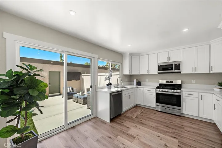 Indoor/outdoor living opening to your private enclosed patio with direct access to 2 car garage