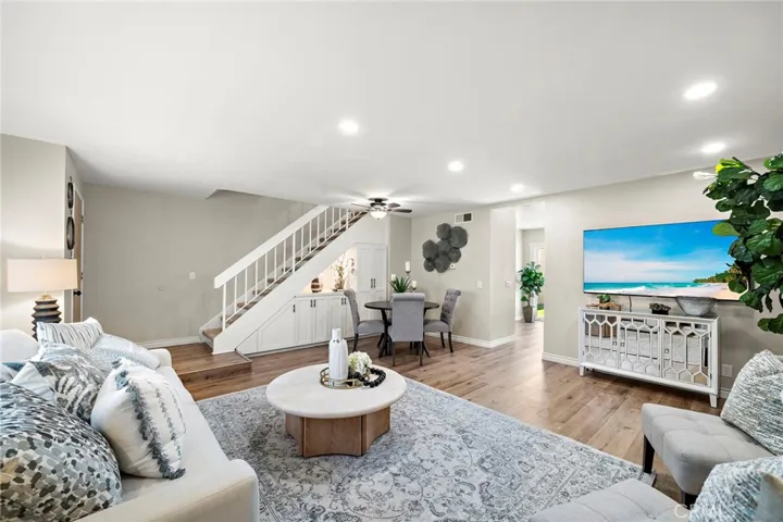 Under stairs, custom built-ins with inside cabinet with outlets for convenient small appliance charging