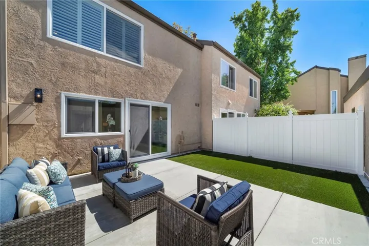 The patio also provides direct access to the oversized 2-car garage
