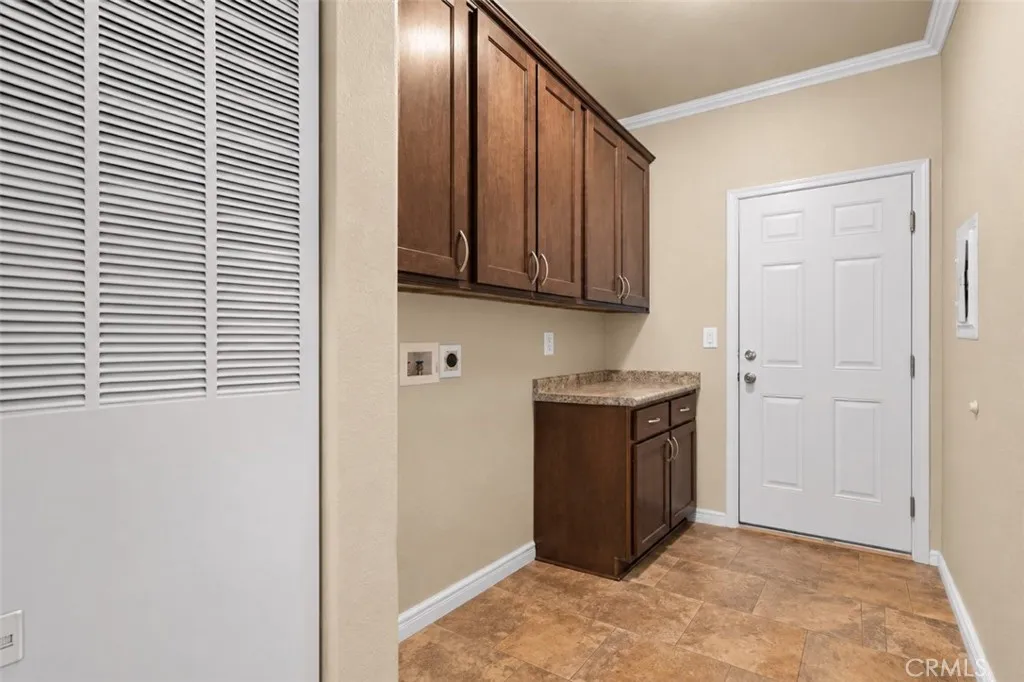 Virtually enhanced laundry room to reflect removal of washer/dryer.