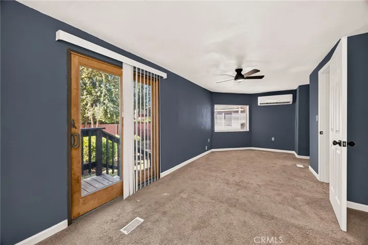 Patio door leads to the back yard off the primary suite