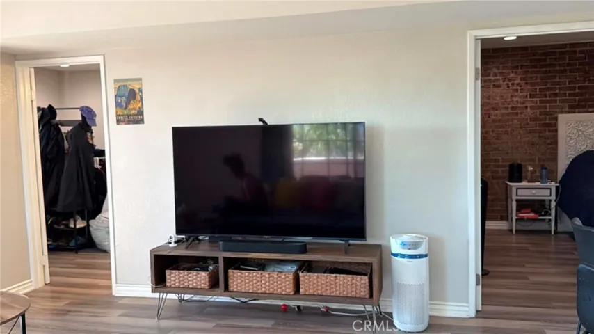 living room showing 2 bedroom entrance