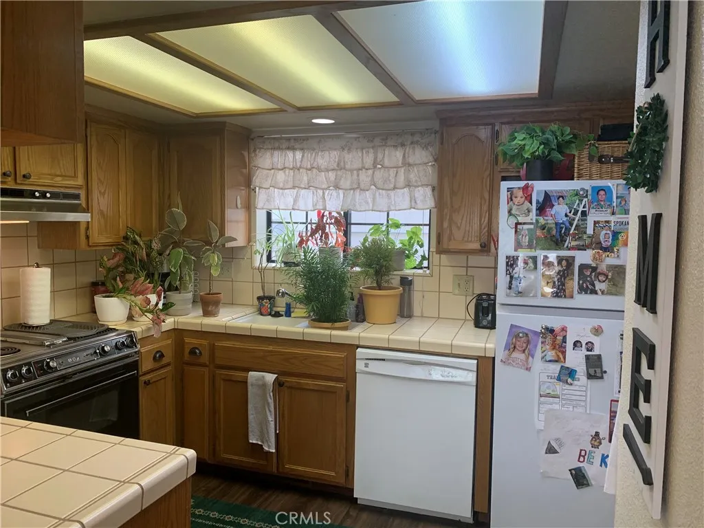 Kitchen with walk in  panry.