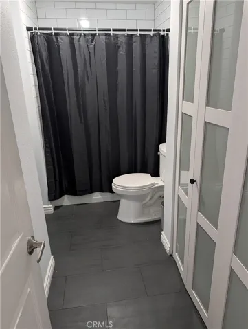 Full bathroom with tub