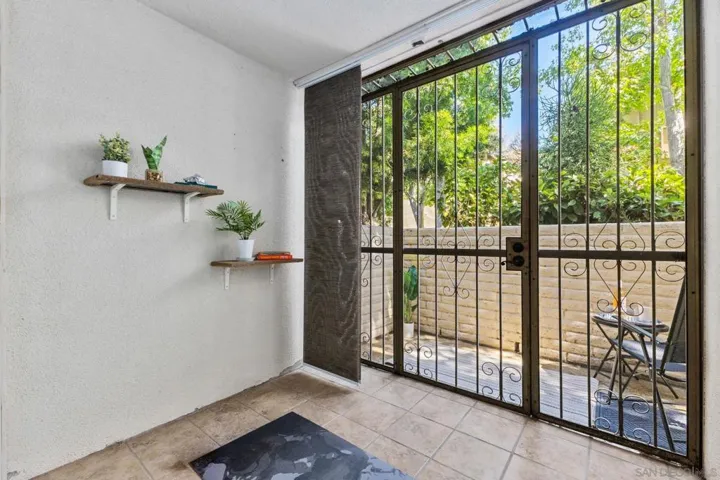 Portion of the patio is covered and enclosed - use as workout space, bonus area, or home office