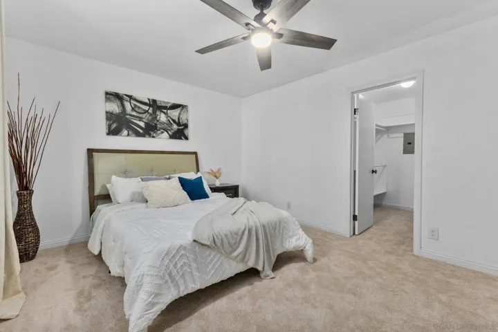 Large bedroom with a walk in closet