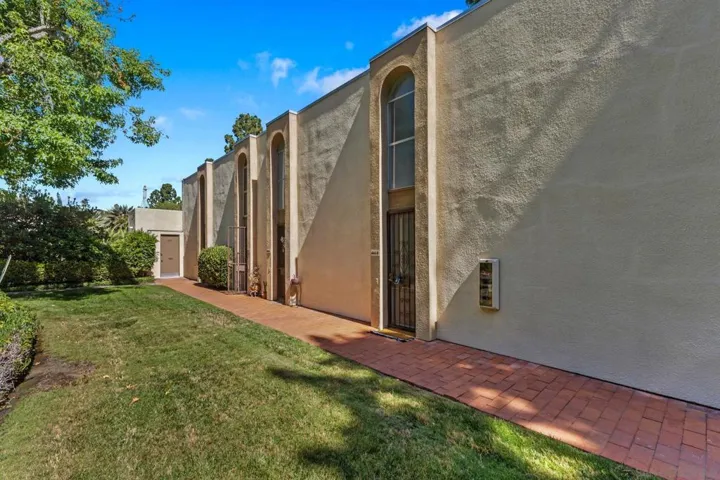 End unit in the back of the complex that faces the greenbelt - privacy and quiet.