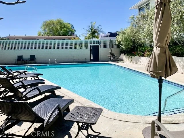 POOL TWO DOORS DOWN