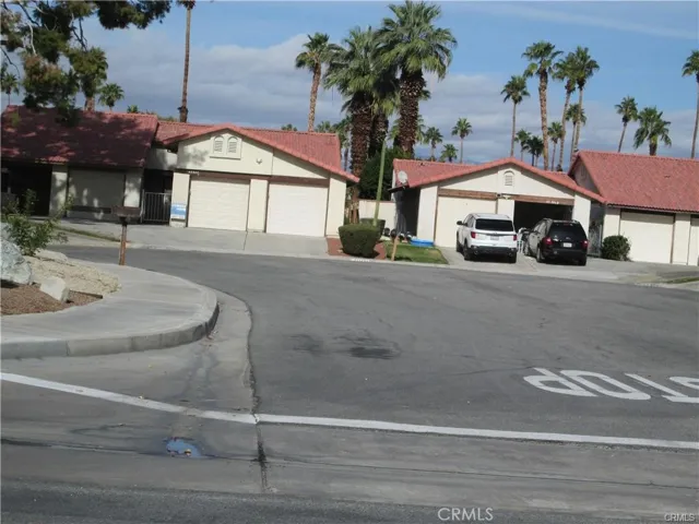 left where there are no cars.  garages!