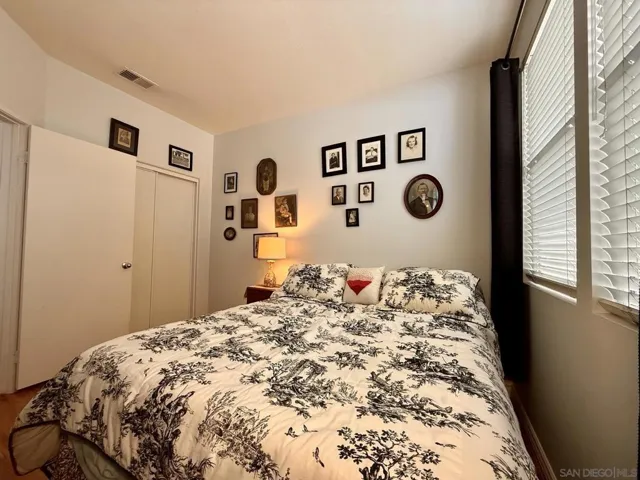 Downstairs bedroom next to a full size bathroom.