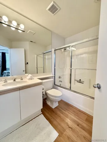 Downstairs full size bathroom located next to bedroom.