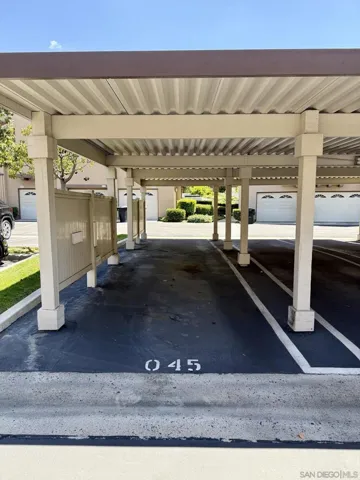 Home has a 1 car garage plus a dedicated carport. The HOA also has guest parking throughout the community.