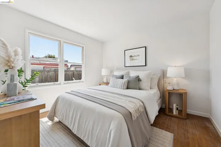 Bright interior with wood-finish flooring and white baseboards