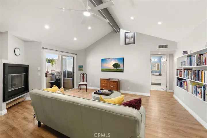 Dramatic vaulted ceilings and an airy open-concept living space filled with natural light.