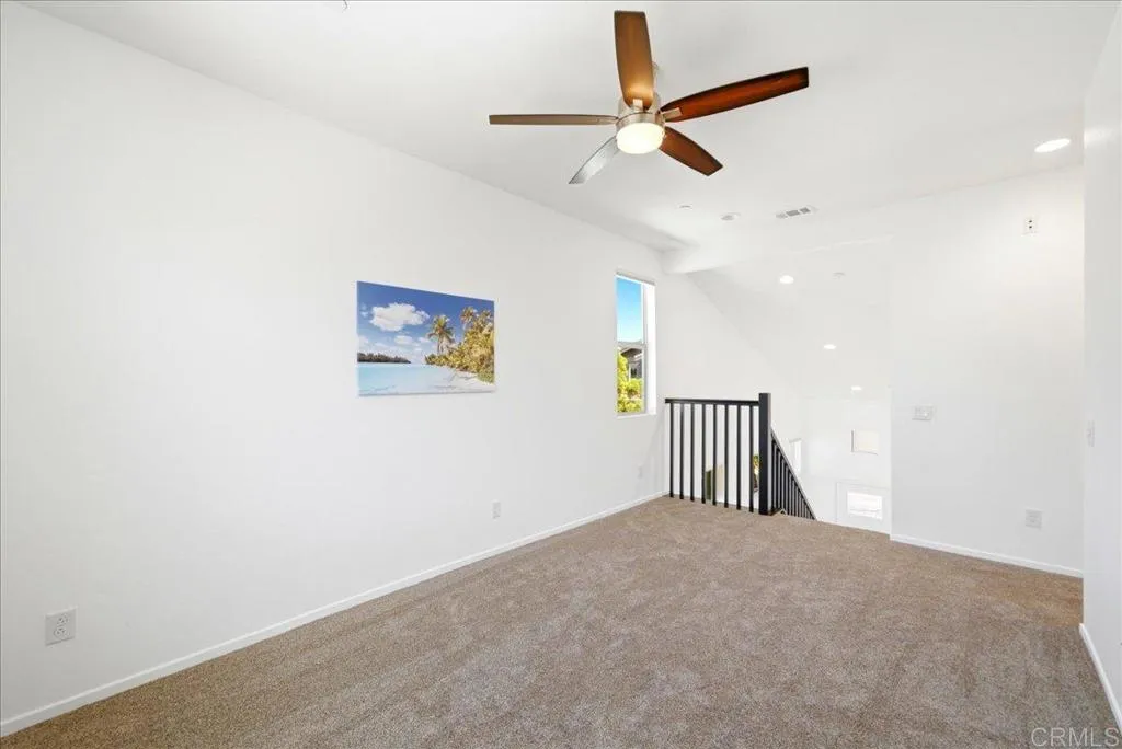 Spacious loft offering versatile living space and abundant natural light.
