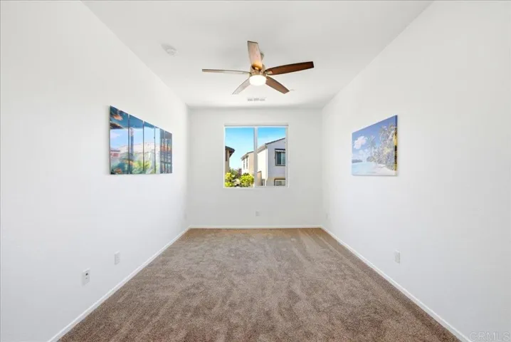 Flexible upstairs loft ideal for a home office, media room, or play area.