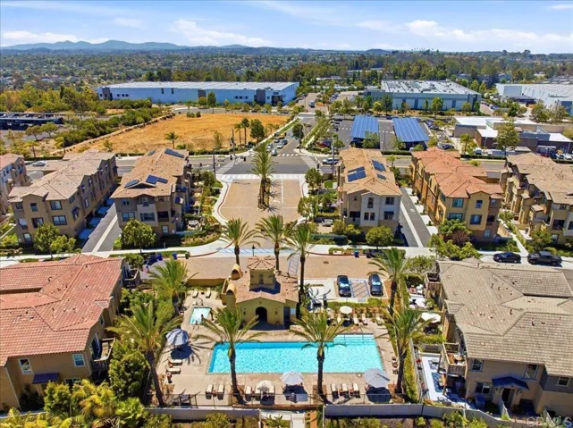 Resort-style pool and gathering spaces in the community recreation area.