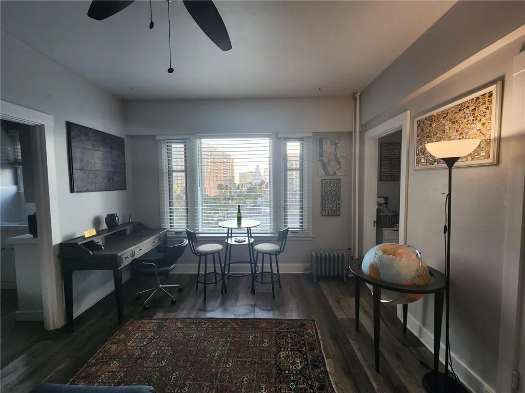 This studio has room for a king size bed, a desk & office space.