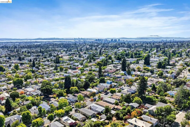 Expansive aerial perspective showcasing a residential neighborhood with a variety of single-story and multi-story homes