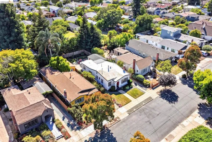 Aerial perspective showcasing multiple residential properties and surrounding streets
