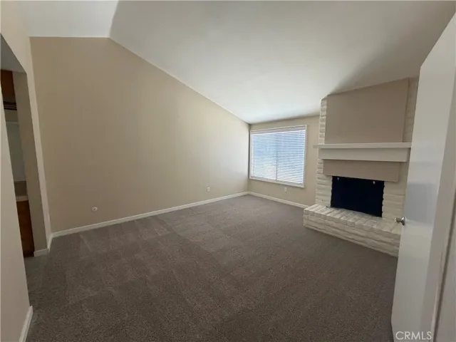 ample size master bedroom with high ceilings and private fireplace