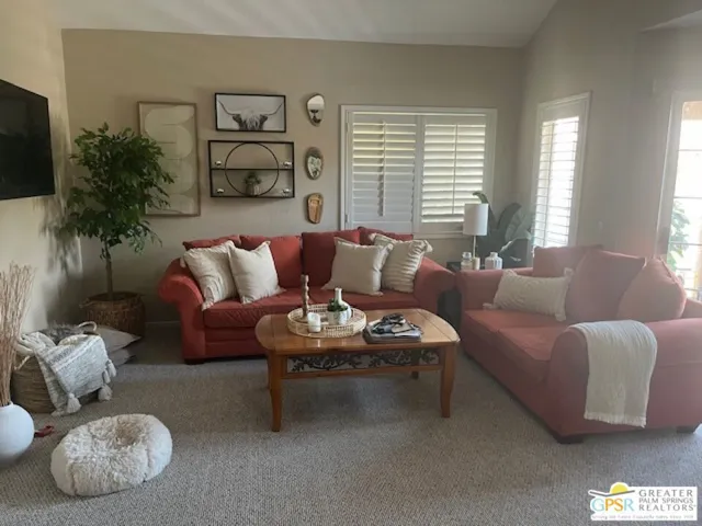 spacious living room with vaul