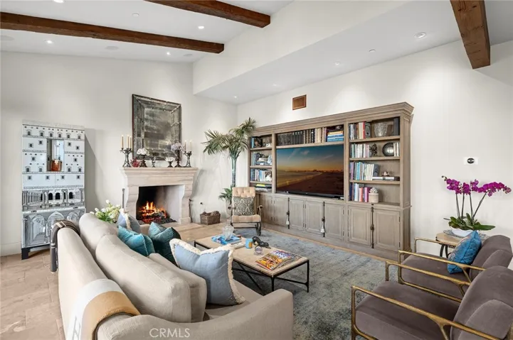 Exceptional ceiling heights throughout the home enhance the sense of volume and architectural presence. T
